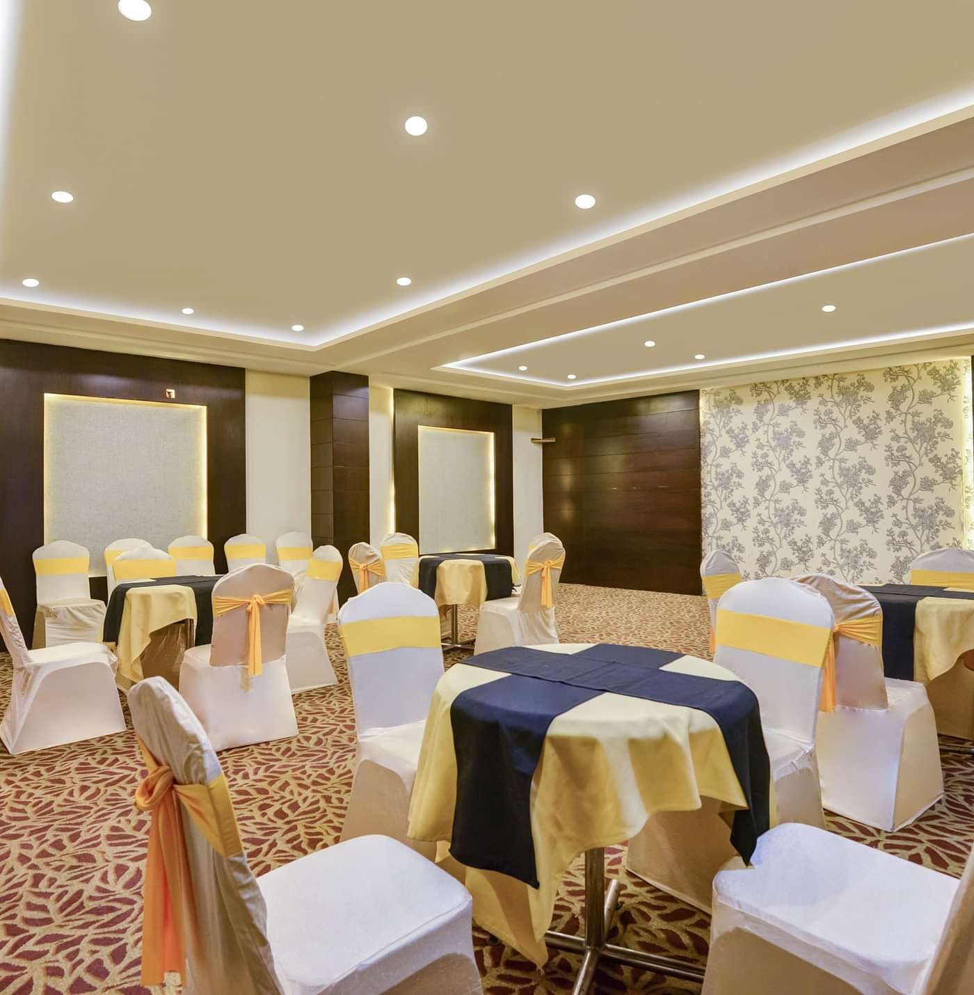 Banquet area with chairs arranged and decorated for the celebration