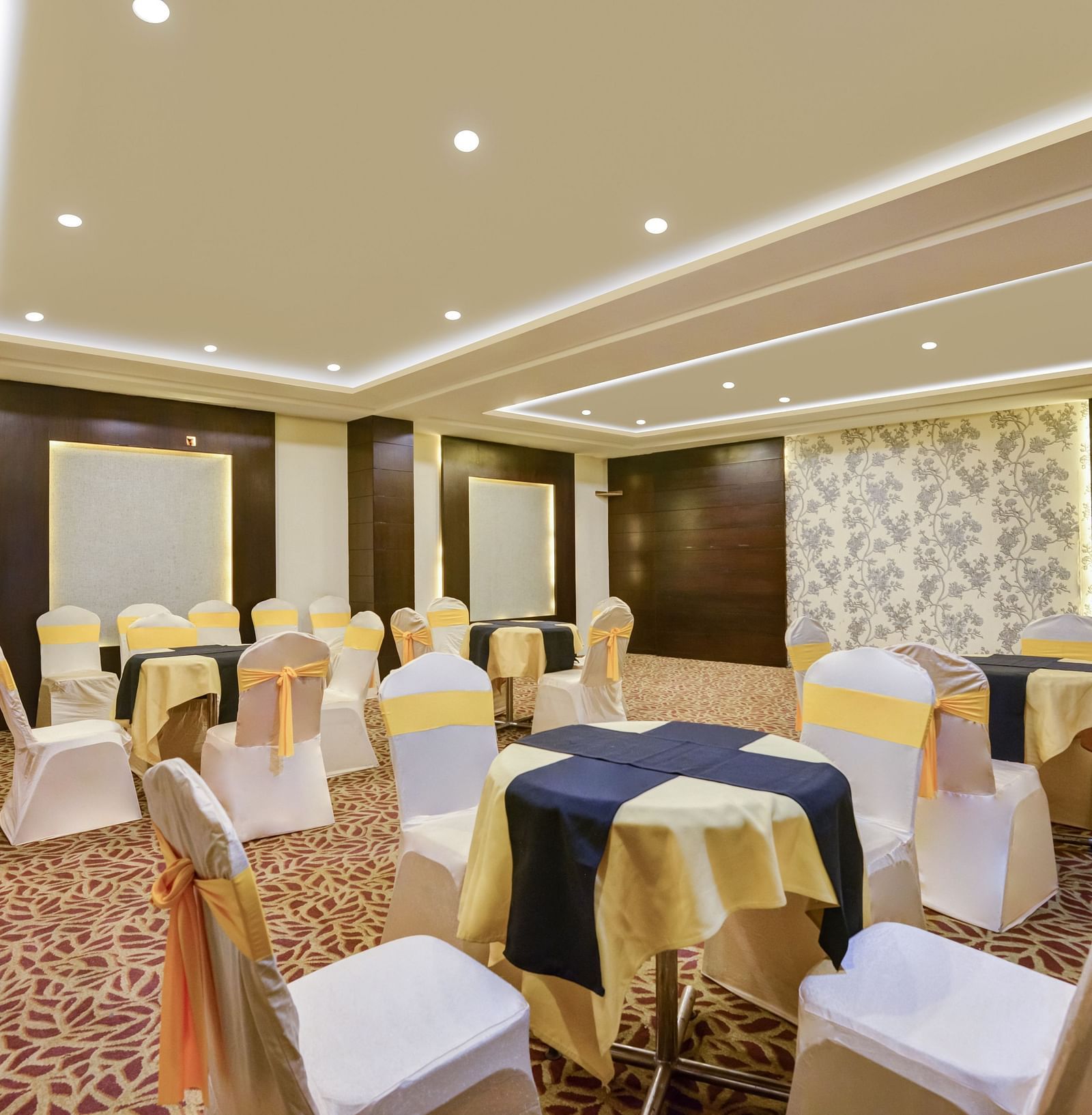 Banquet area with chairs arranged and decorated for the celebration