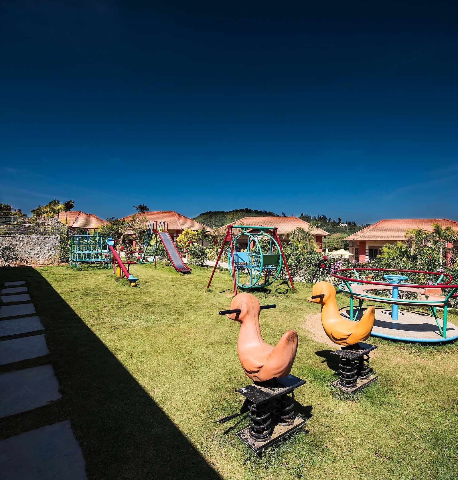 An outdoor play area during the day | Woodstock Resorts, Coorg