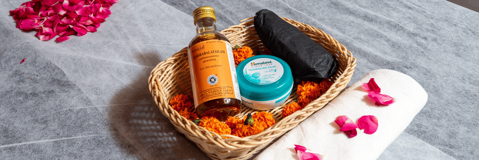 Spa table with oils and flowers at DLS Hotels On The Ganges.