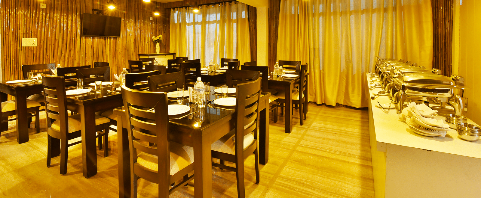 A shot of the buffet table in the restaurant of the resort | DLS Kapoor Resort Manali
