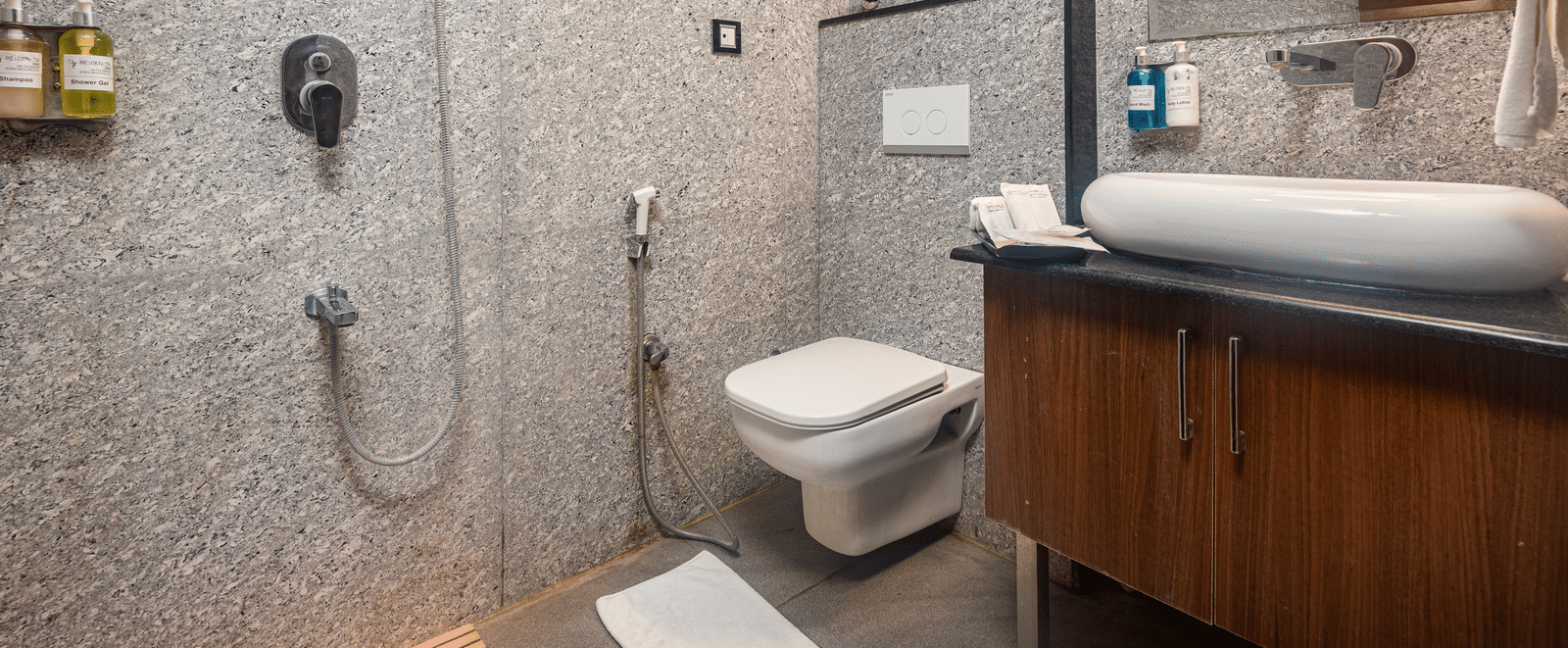 Bathroom with modern fittings and shower at DLS Hotels On The Ganges.