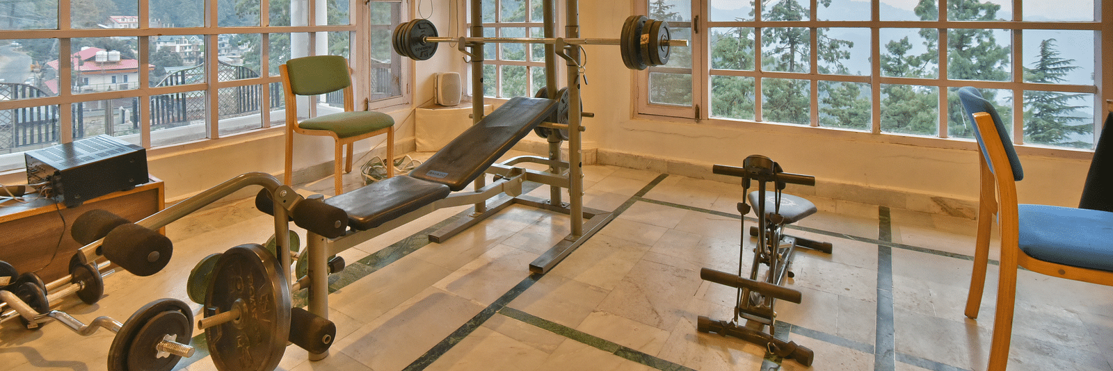 Gym space with equipment at DLS Hillcrest Resort, Shimla.