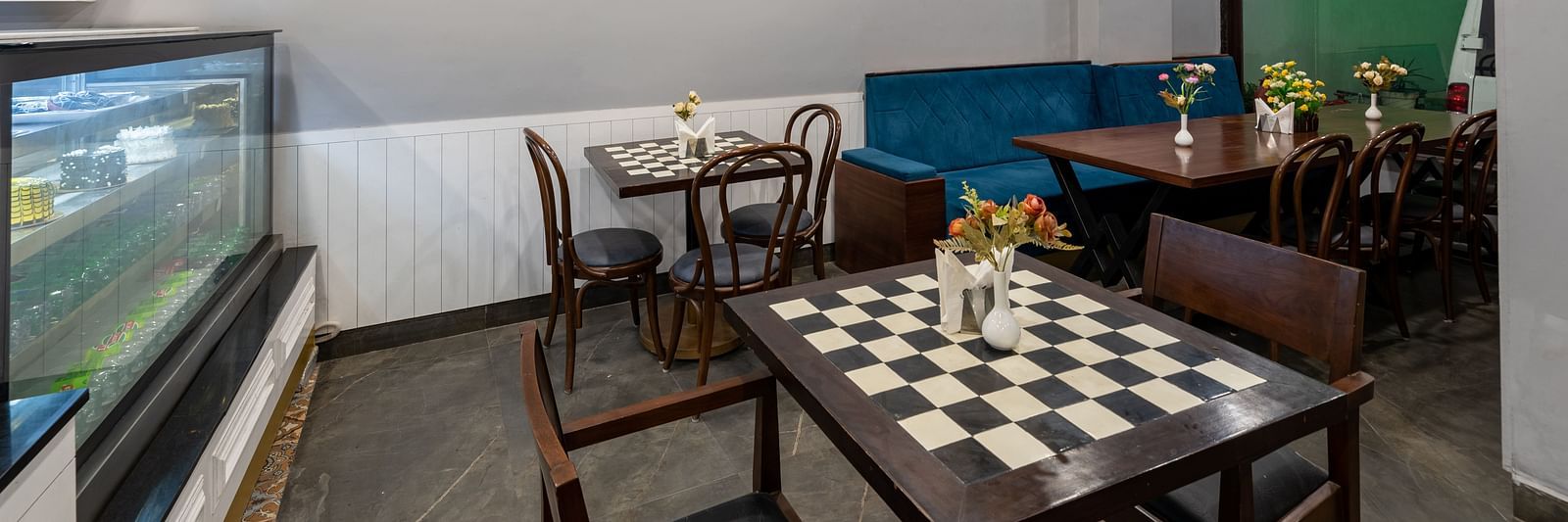 Side view of the cafe with air-conditioner attached to the ceiling at DLS The Classio, Rishikesh