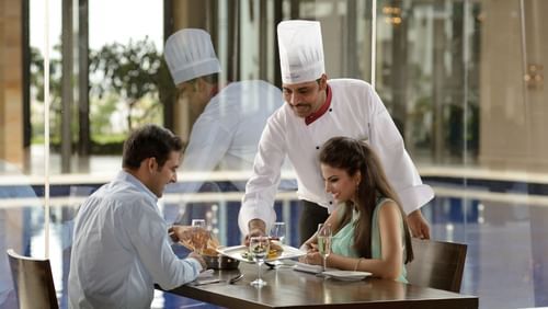 Enjoying Delicacies at Sarovar Marasa Sarovar Premiere Tirupati, Tirumala Hotels 4