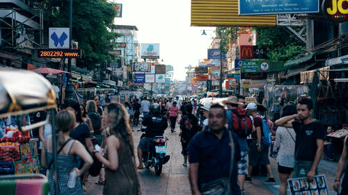 street filled with people shopping around.