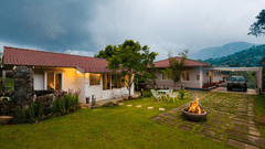 Annexe and Main House Exterior with out seating and campfire - Ibex Resort, Kotagiri