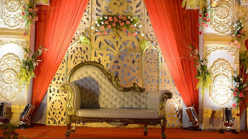 The wedding podium with a diwan at the centre - Hotel Wedlock Greens Dhanbad