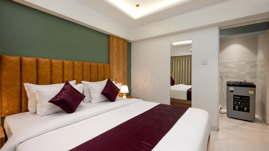 Spacious king bedroom with ensuite bathroom at Home2 Residency, Mumbai Airport