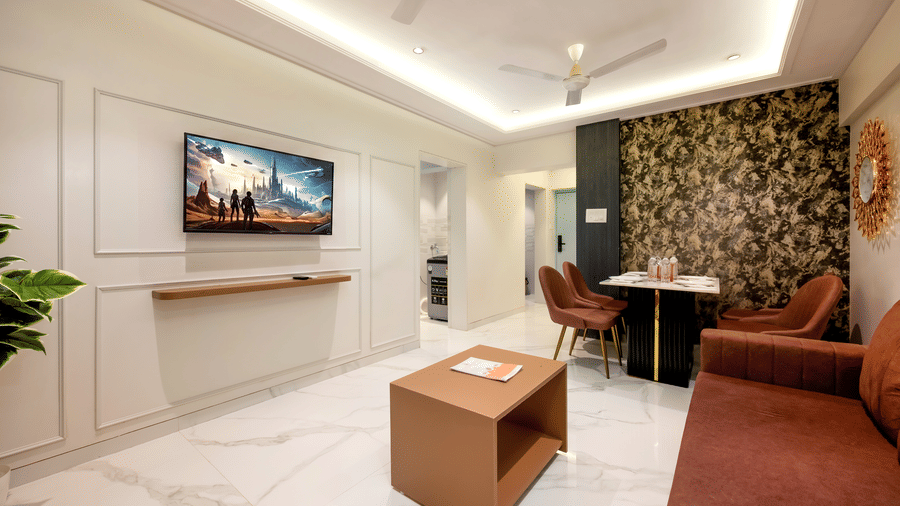 Elegant living area with dining space at Home2 Residency, Mumbai Airport
