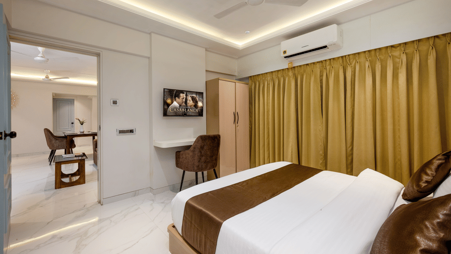 Modern king bedroom with work desk at Home2 Residency, Mumbai Airport