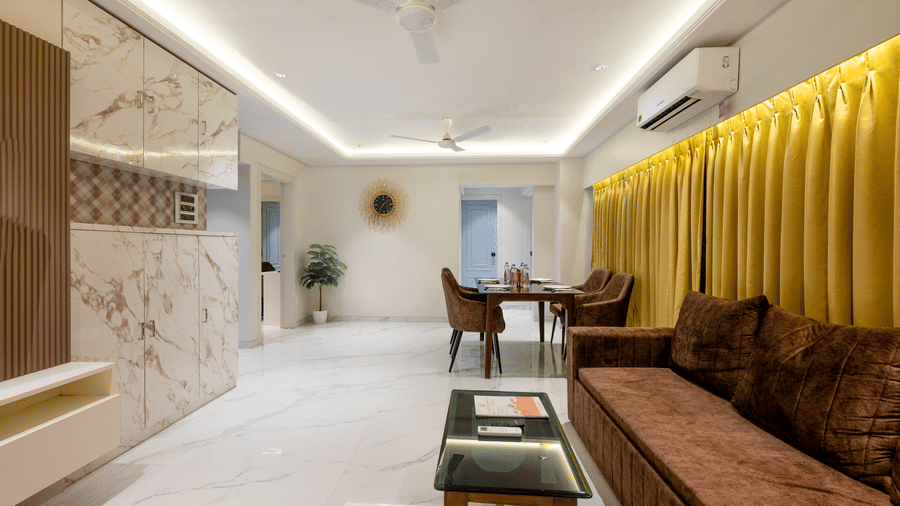 Contemporary living room with comfortable seating at Home2 Residency, Mumbai Airport