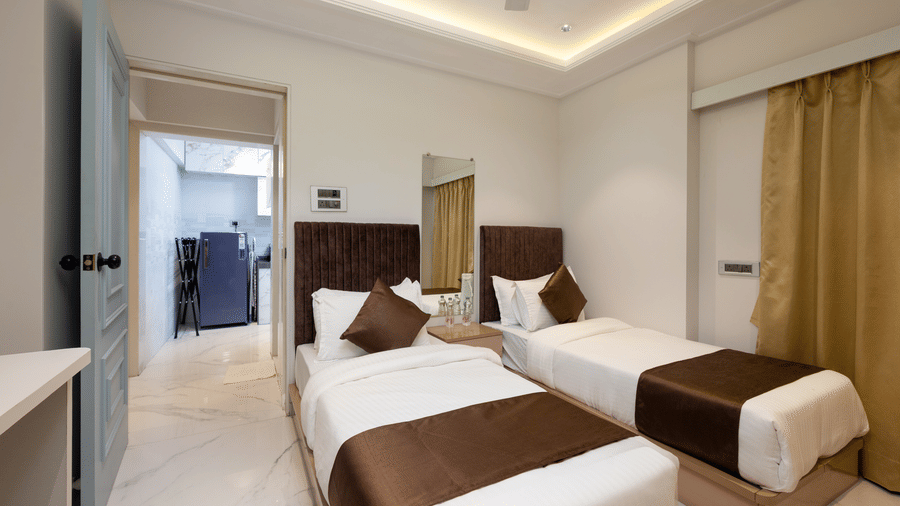Twin bed studio apartment near Mumbai Airport with modern amenities