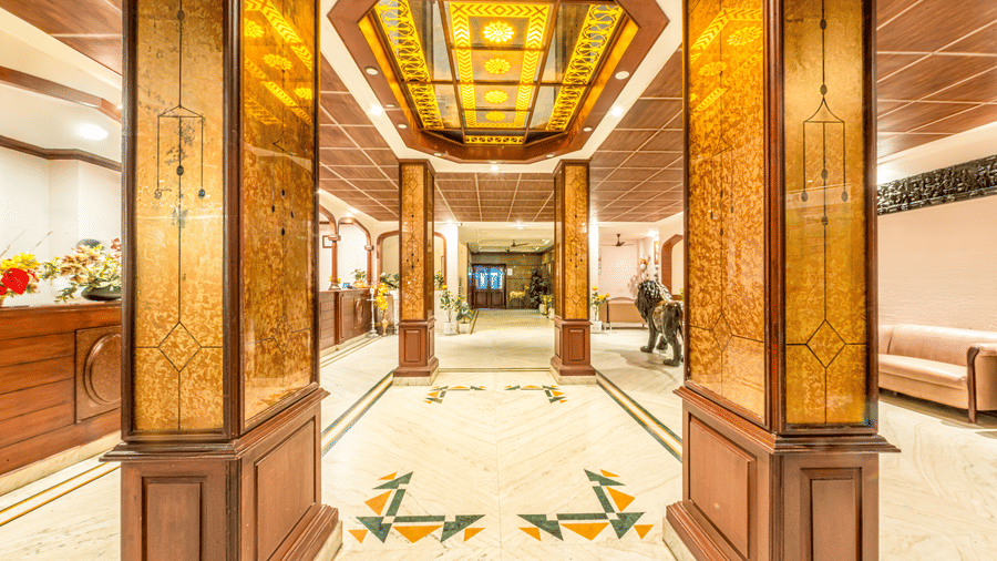 Grand lobby entrance at Jayaram Hotel, Pondicherry showcasing elegant interiors and welcoming décor.