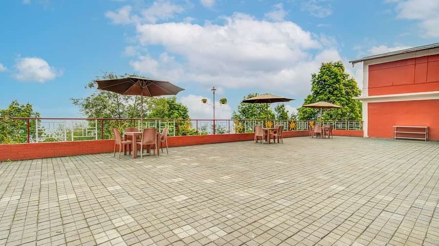 Outdoor image of Summit Tashi Ghang Heritage Resort, Pelling sitting area with clear sky in the background