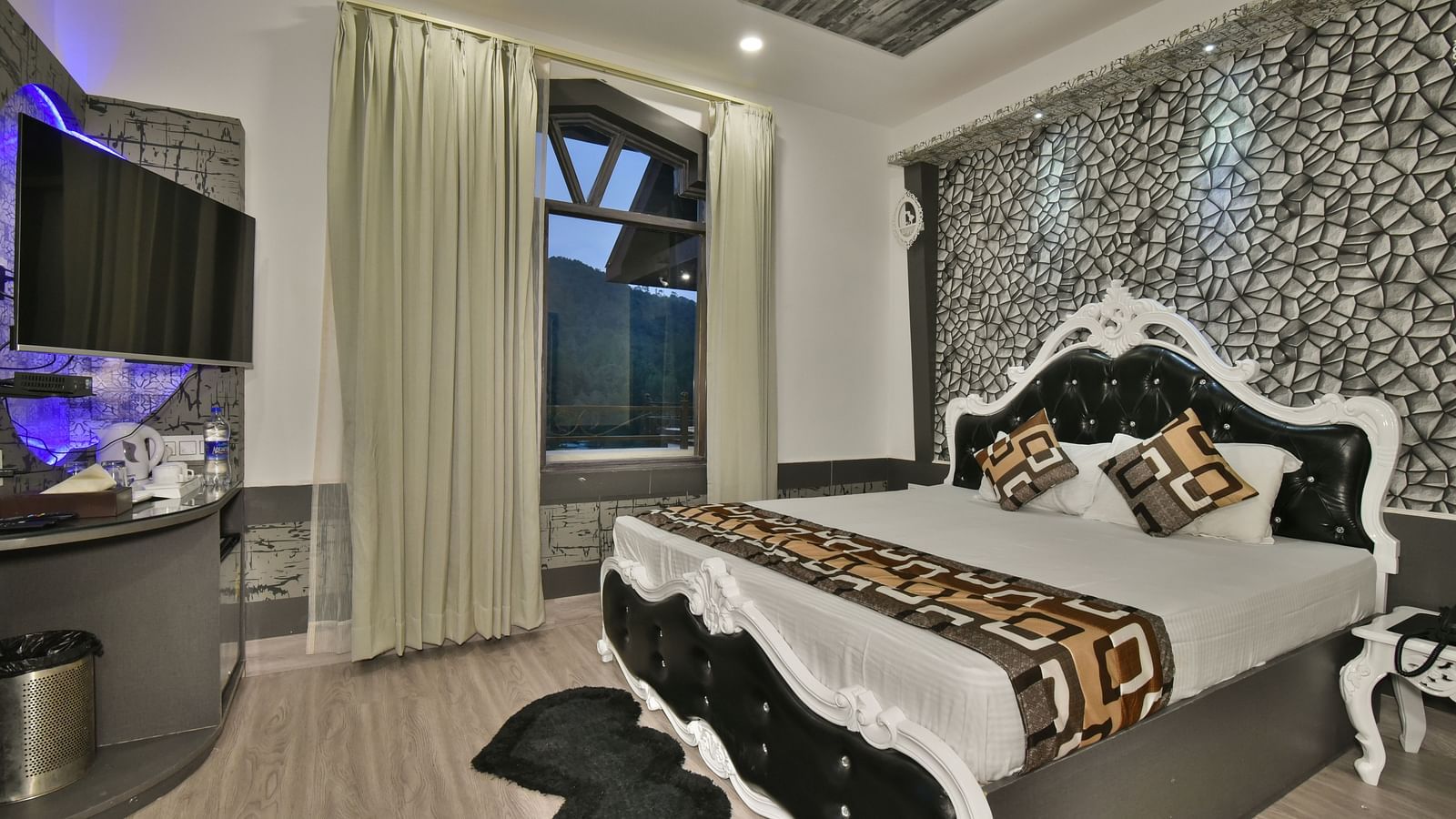 A Luxury Room at DLS Dalhousie  Valley Resort with a premium bed and balcony