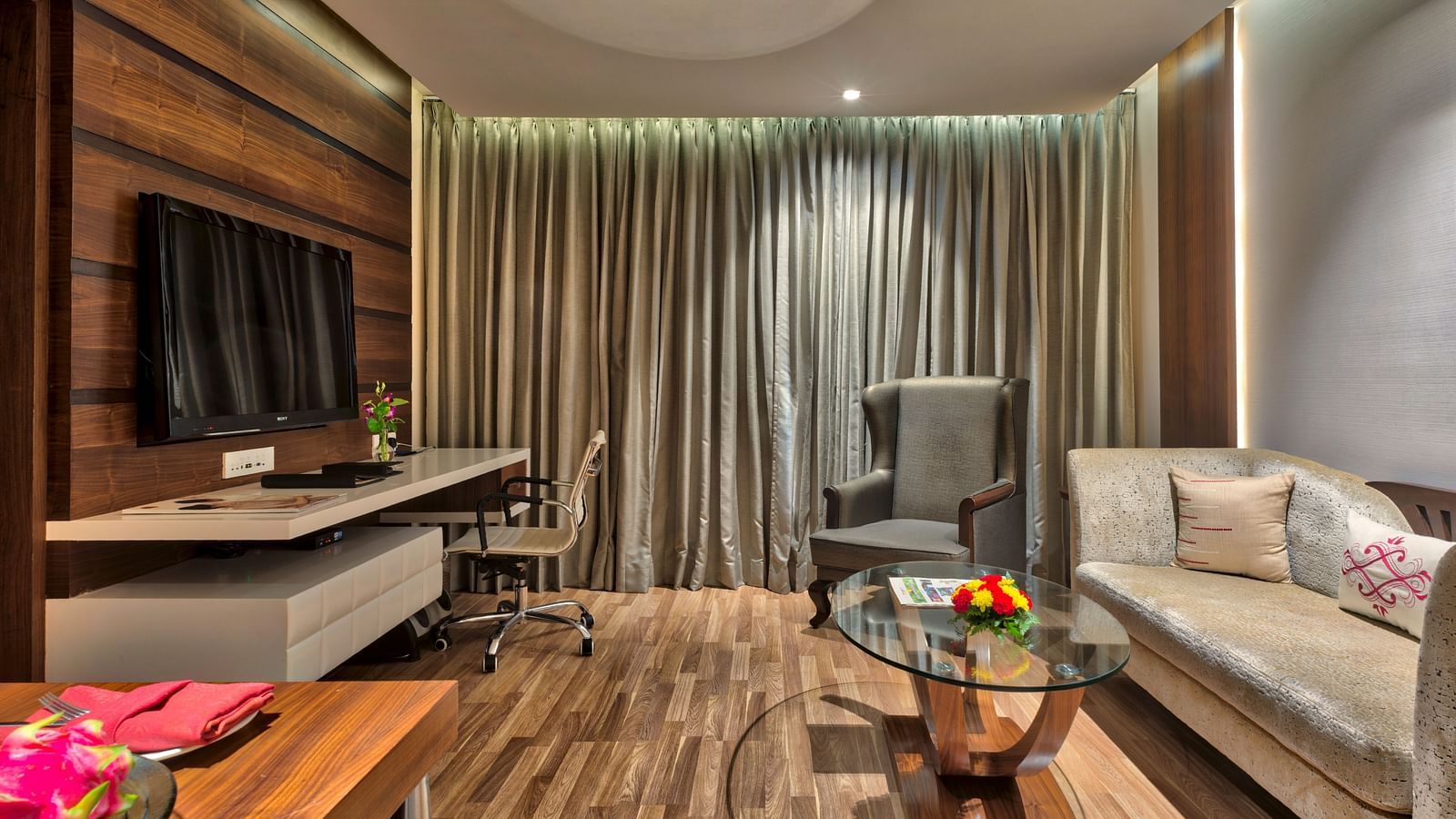 Living Room of Deluxe Suite at Grand Chennai By GRT Hotels.