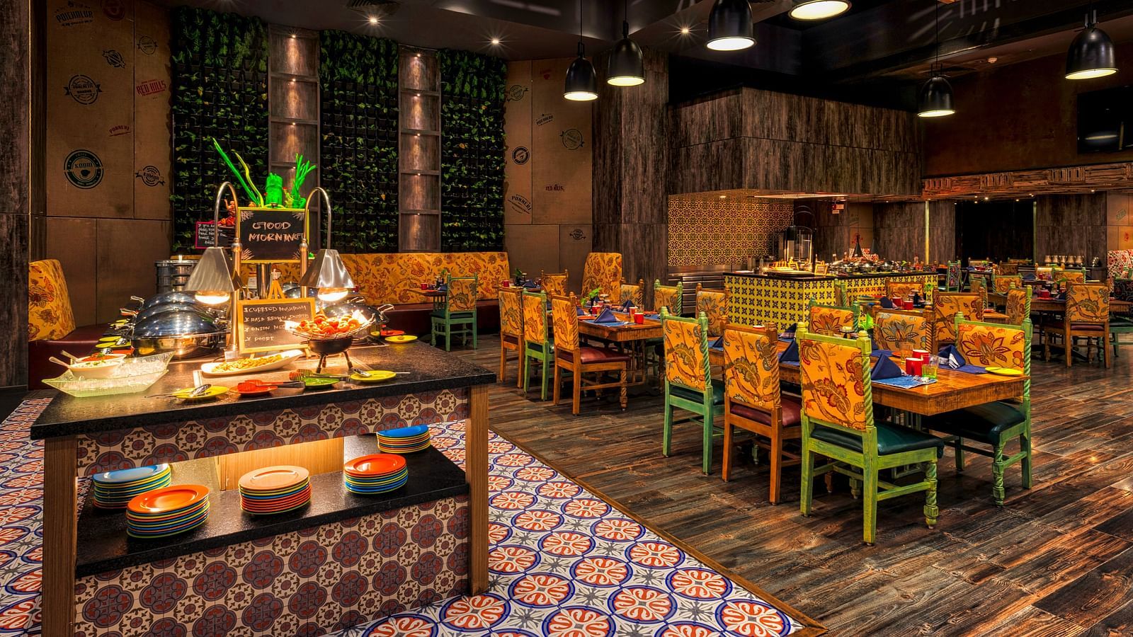 Seating arrangement of the restaurant at Grand Chennai By GRT Hotels.