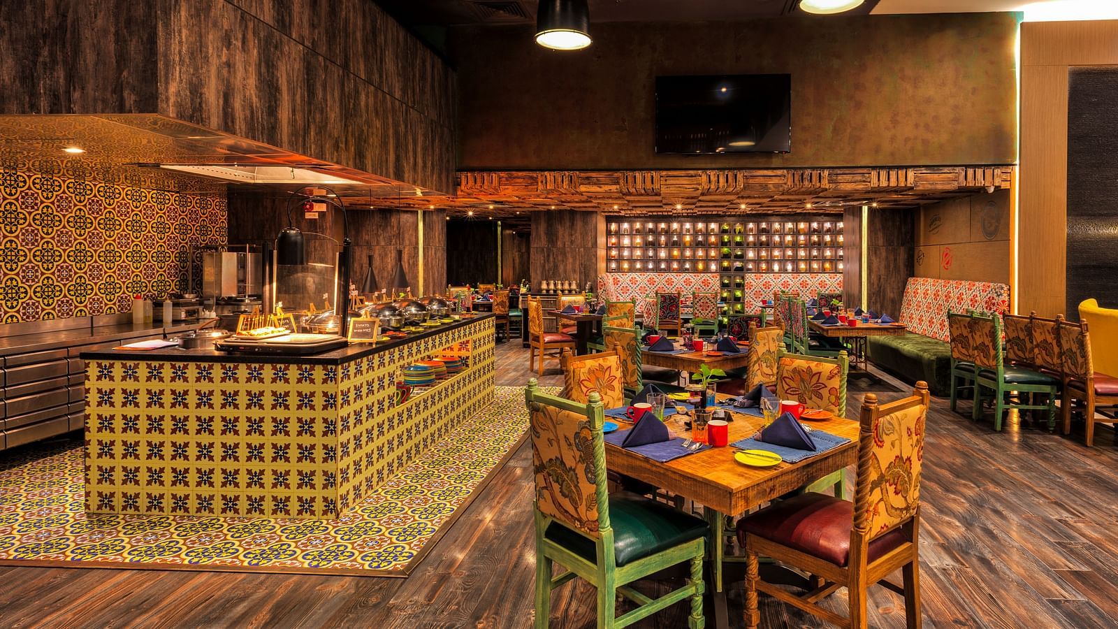 Seating arrangement of the restaurant at Grand Chennai By GRT Hotels.