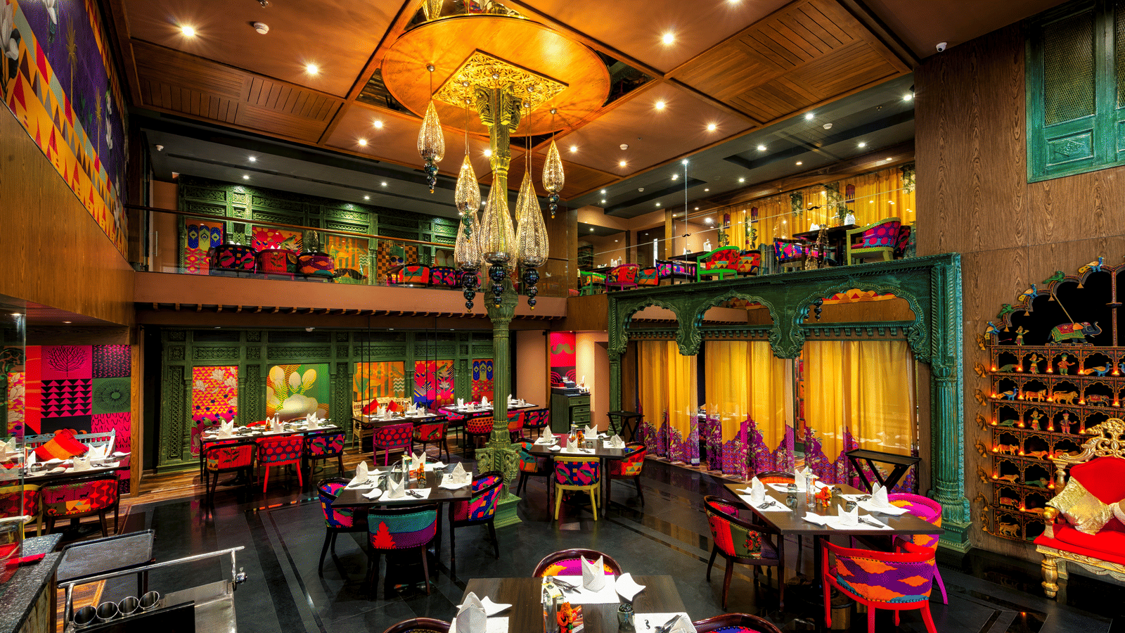 Seating arrangement of the restaurant at Grand Chennai By GRT Hotels.