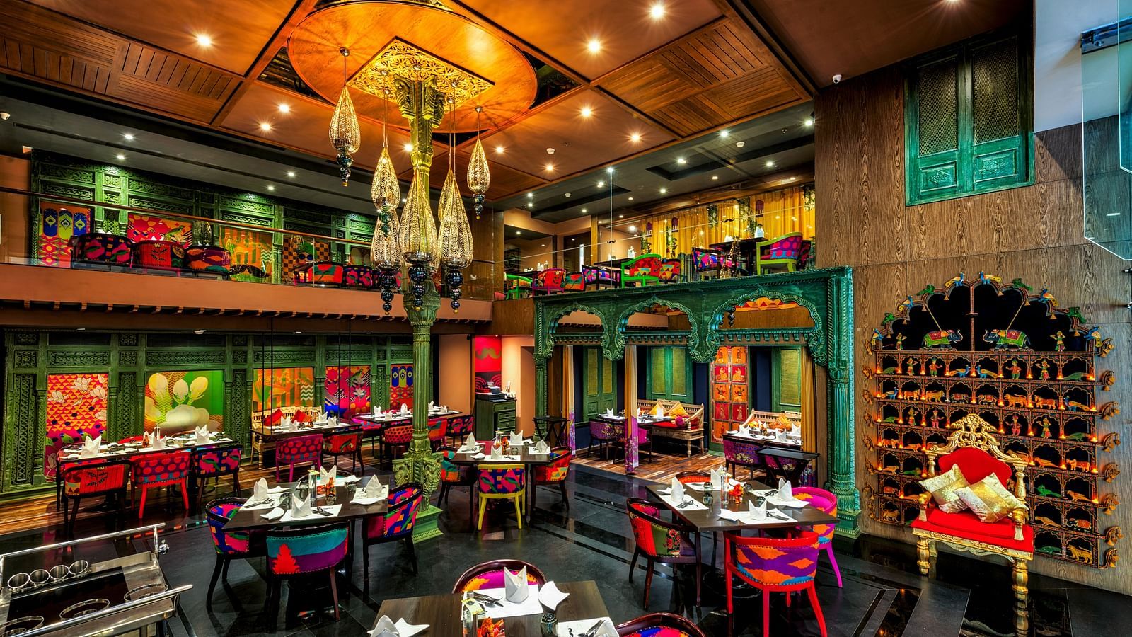 Seating arrangement of the restaurant at Grand Chennai By GRT Hotels.