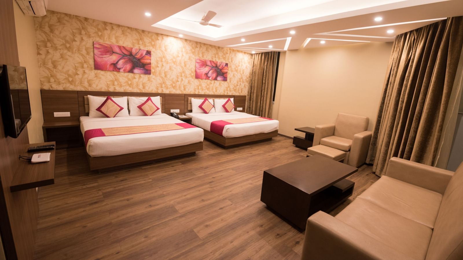 Family Rooms with Complimentary Wi-Fi showcasing queen size twin beds in a room along with various room amenities - Le ROI Digha Hotel West Bengal2
