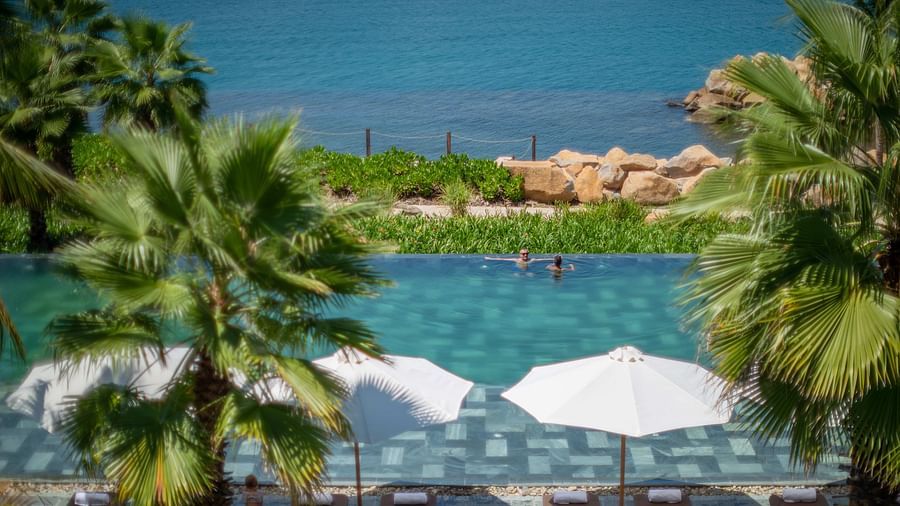 An aerial view of the pool at our resort with parasol by the side - Alibu Resort Nha Trang