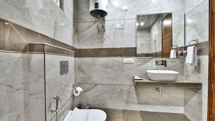Vanity area in Premium Room With Balcony at DLS Ark Holiday Inn, Banikhet.