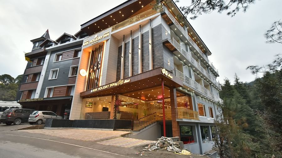 Exterior view of DLS Ark Holiday Inn, Banikhet during the day.