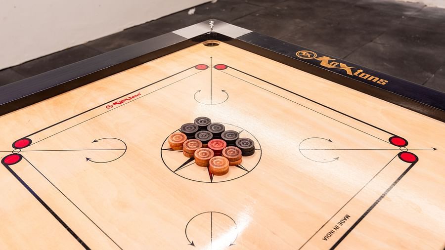 Indoor gaming area at DLS Divine River Resort and Spa featuring a carom board.