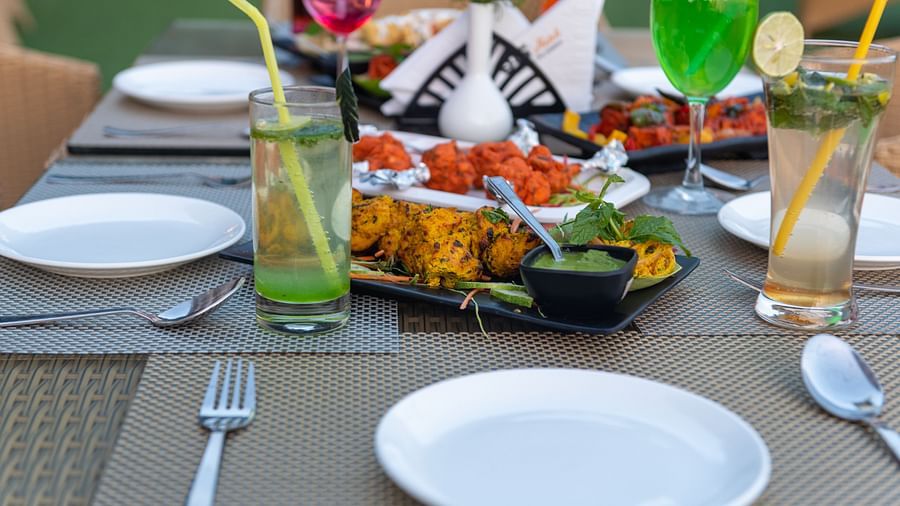 Food and drinks placed on the table at DLS Highland Resort and Spa, Mussoorie.