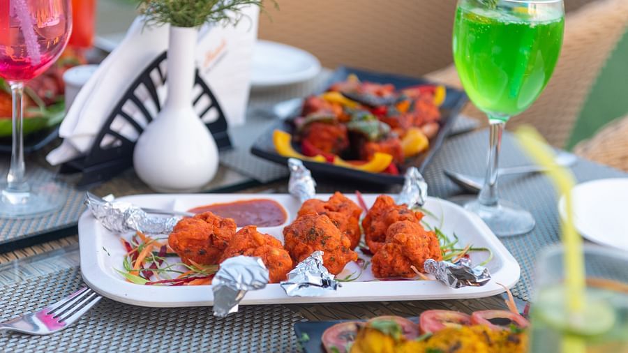 Food and drinks placed on the table at DLS Highland Resort and Spa, Mussoorie.