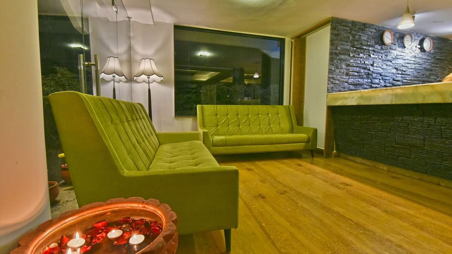 Lobby space with two long sofas at DLS Hillcrest Resort, Shimla