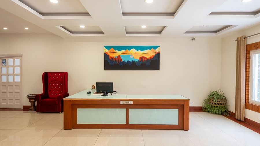A modern and welcoming reception area at DLS Tehri Club Resort, ready to assist guests.
