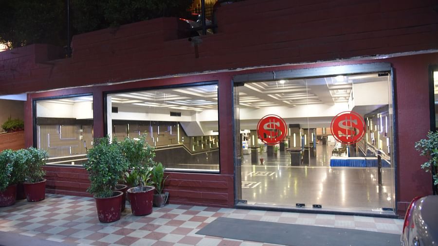 Entrance of the Banquet Hall with full length glass doors and wide windows at Hotel Gold, Panipat.