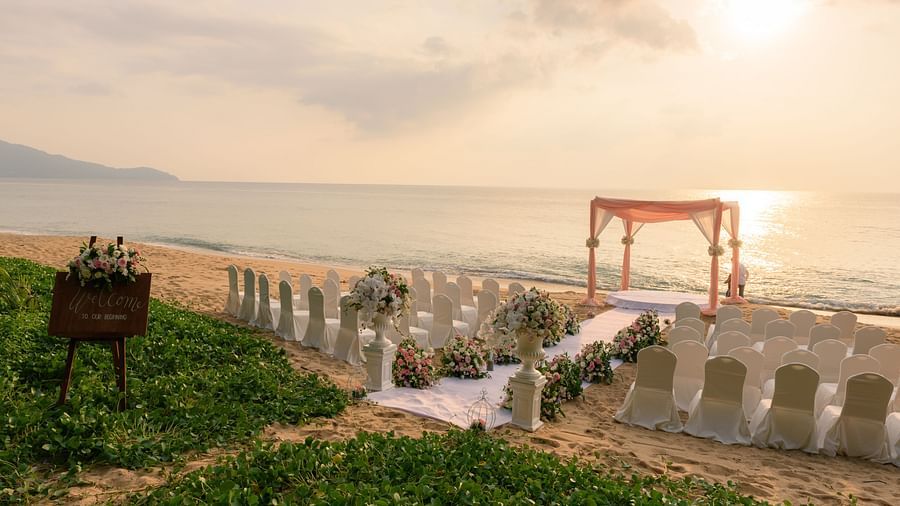 The wedding venue on the beach overlooking the ocean with a beautiful sunset in the background - Maikhao Dream Villa Resort & Spa, Phuket