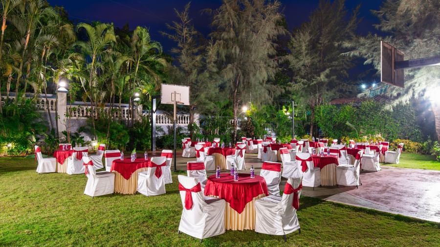 Lawn area arranged in cluster seating for an event at Mayur Retreat.