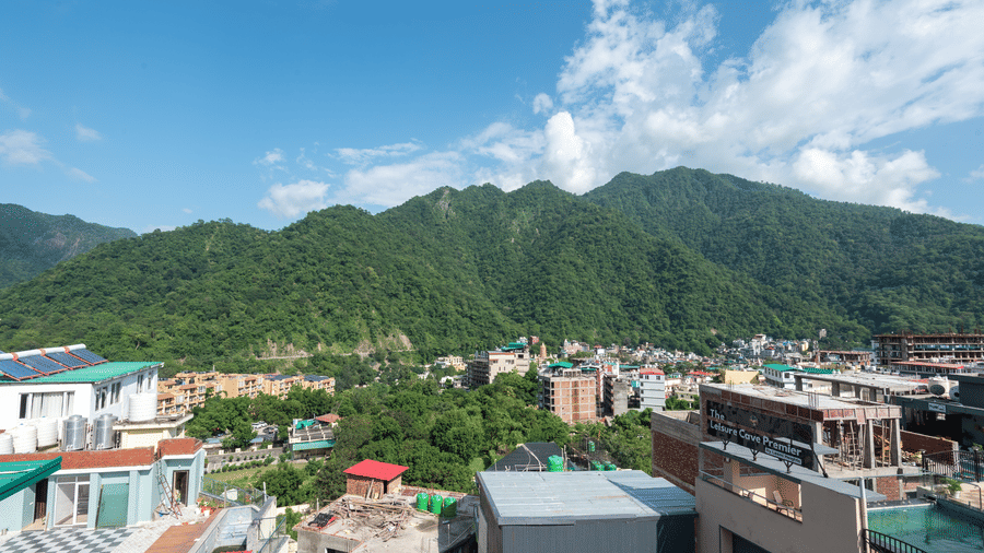 Hill view with clear sky and buildings near DLS Hotels On The Ganges.