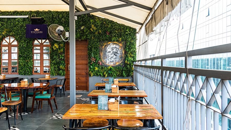Seating near balcony of Kyba restaurant at Visthara - Urban Boutique Hotel 13
