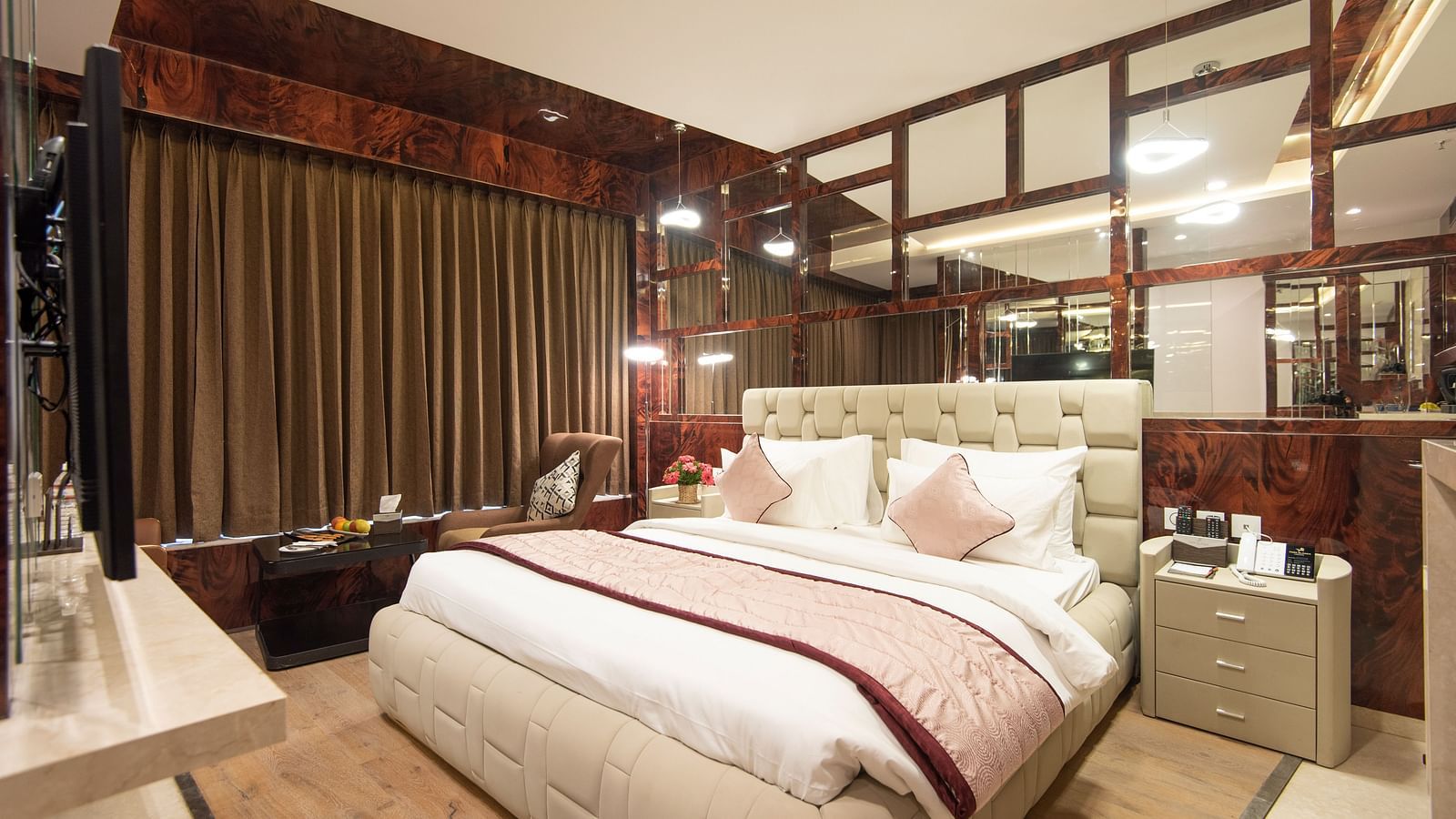 Executive Suite feacturing a bed and television at Hotel Park Elanza, Coimbatore