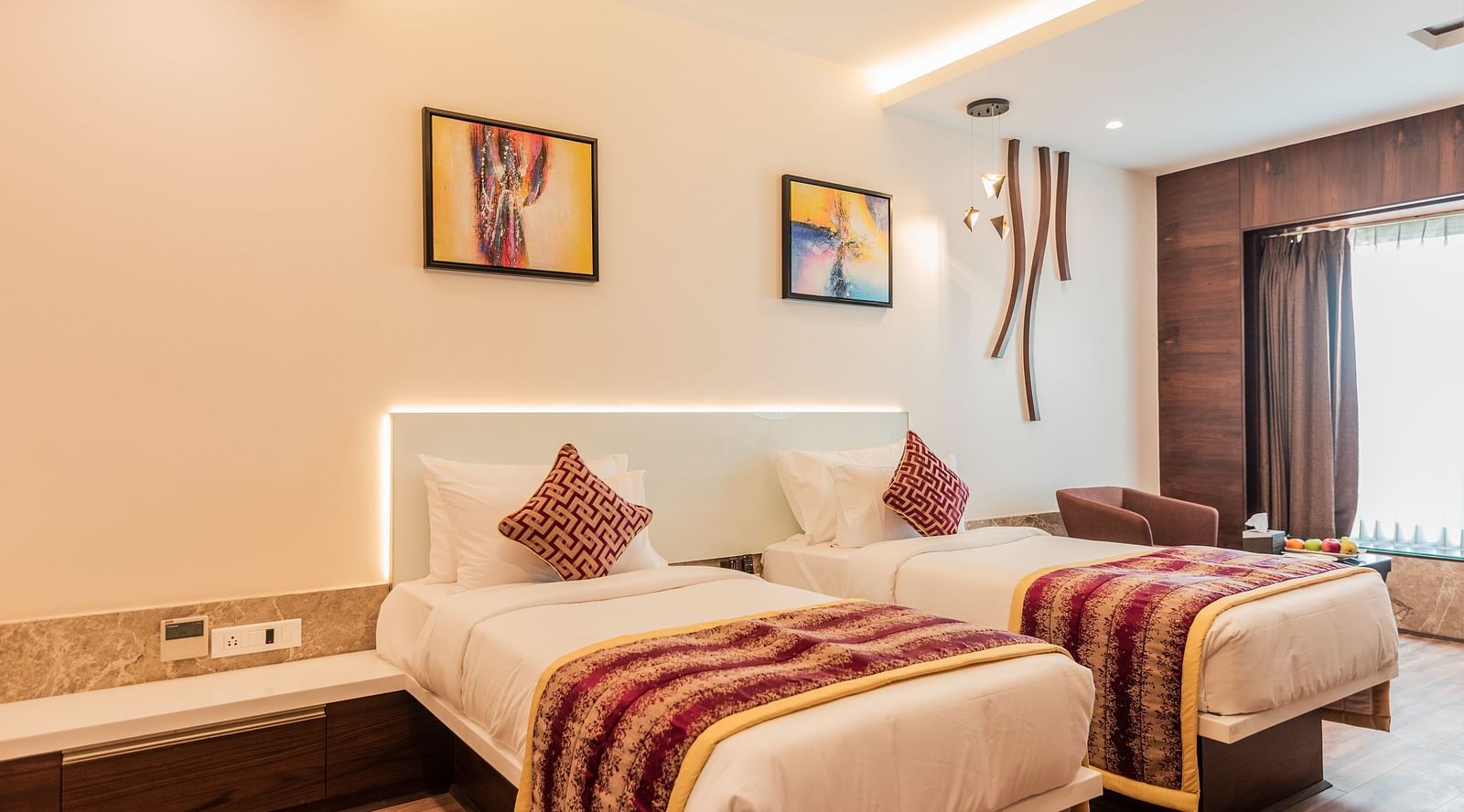 Premium Room at Hotel Park Elanza, Coimbatore featuring twin beds overlooking a window
