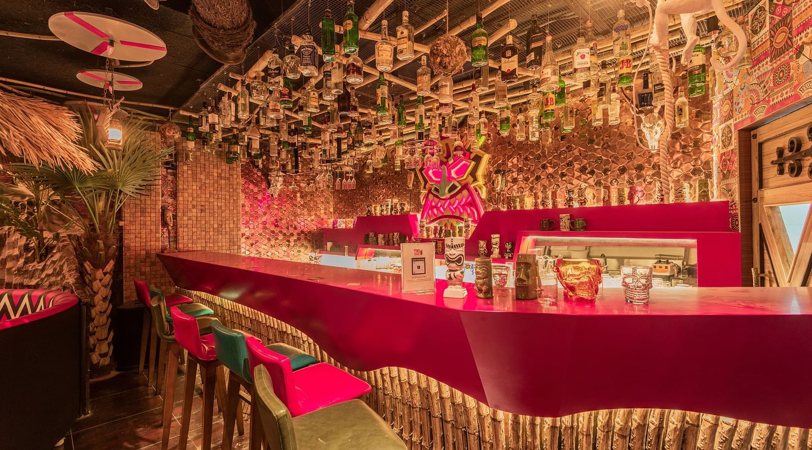 Tiki Tako at Hotel Park Elanza, Coimbatore featuring bar counter and chairs