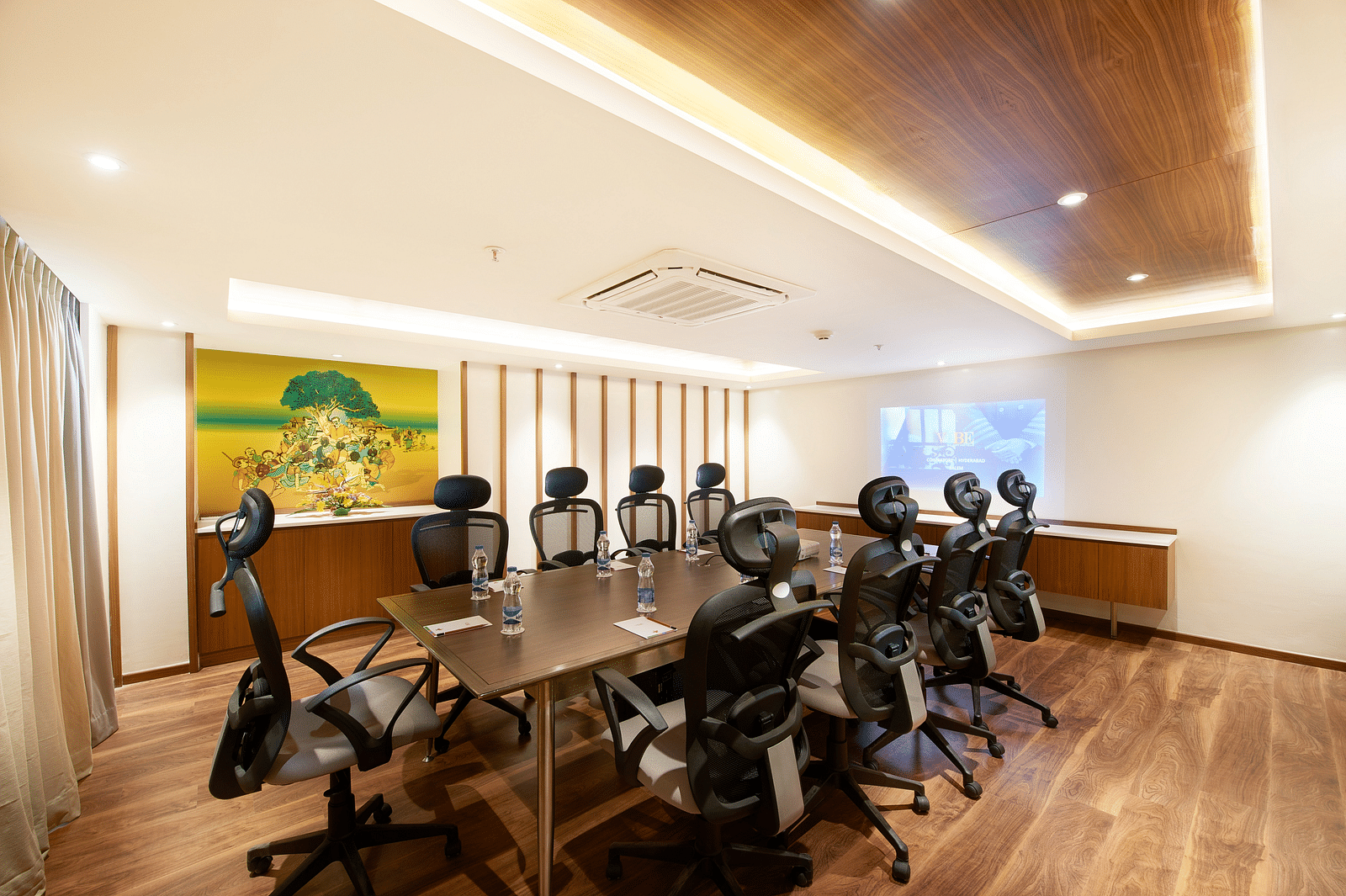 an image of the boardroom with projector at Zibe Salem by GRT Hotels
