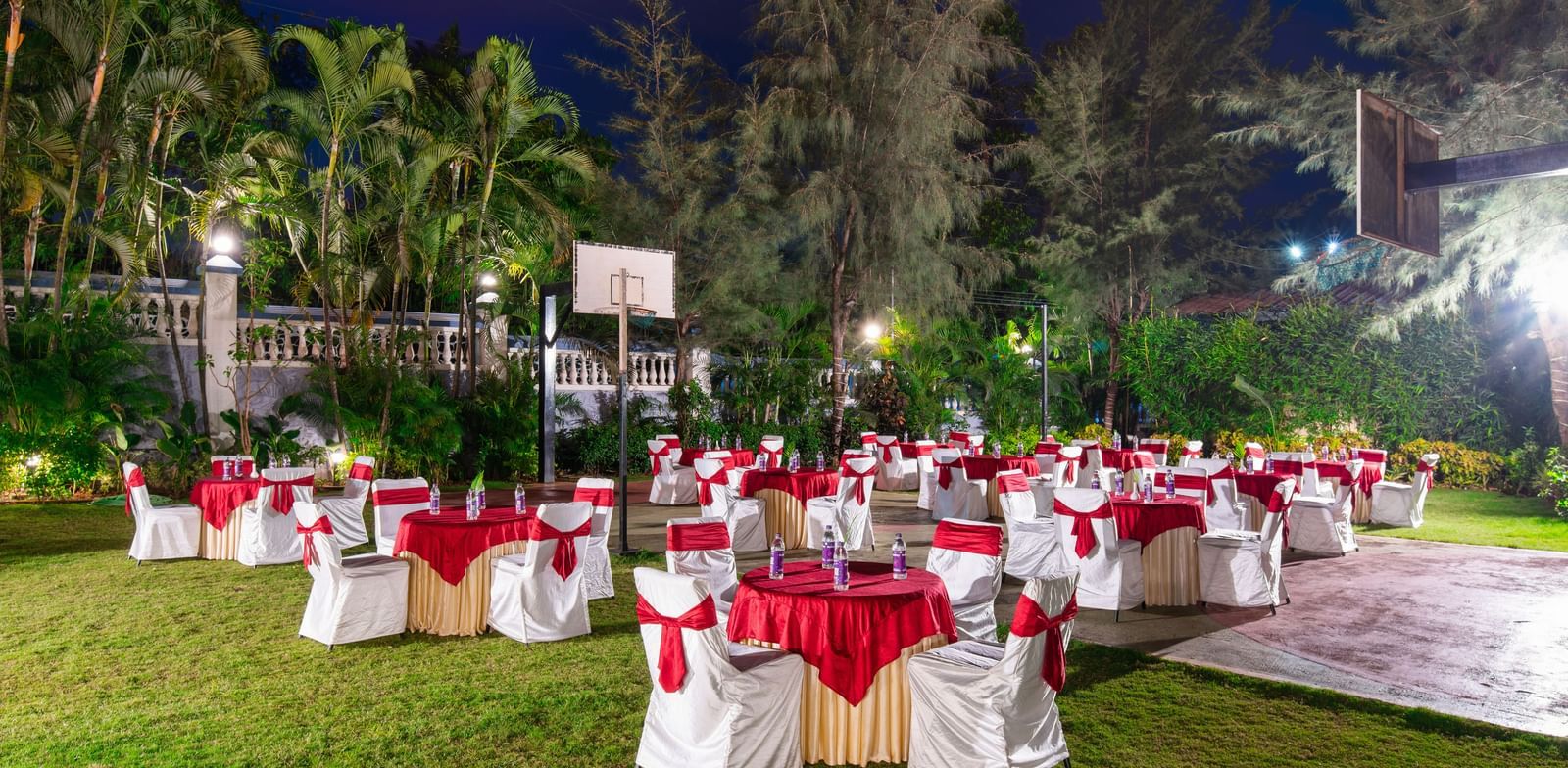 Lawn area arranged in cluster seating for an event at Mayur Retreat.