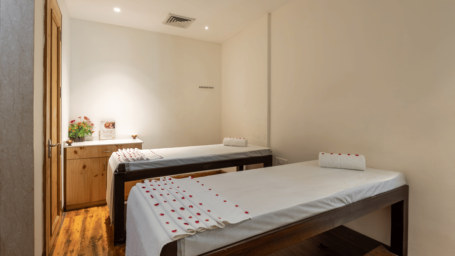 side view of spa beds decorated with rose petals at DLS The Classio
