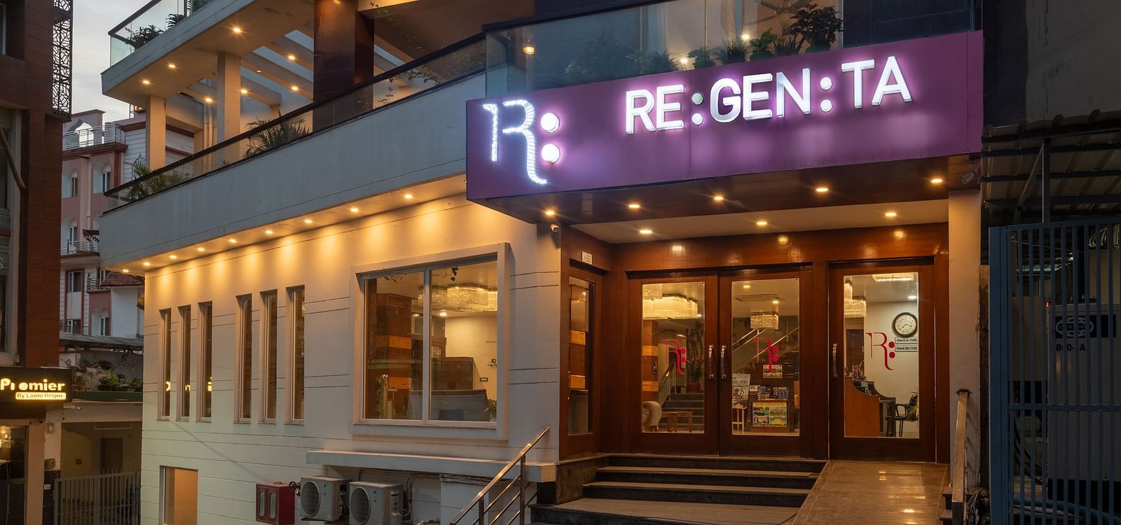 Facade of Regenta Inn DLS, Rishikesh with warm lights.