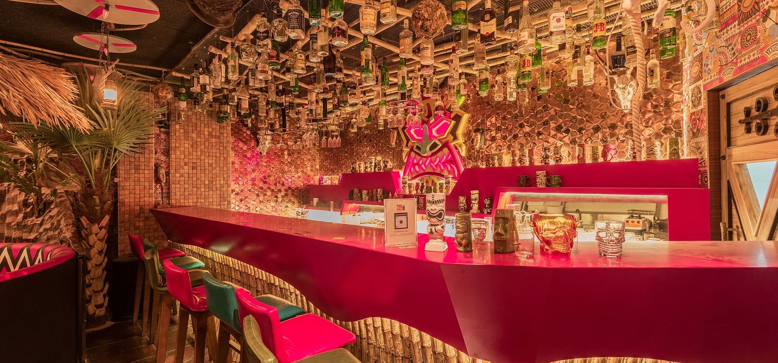 Tiki Tako at Hotel Park Elanza, Coimbatore featuring bar counter and chairs