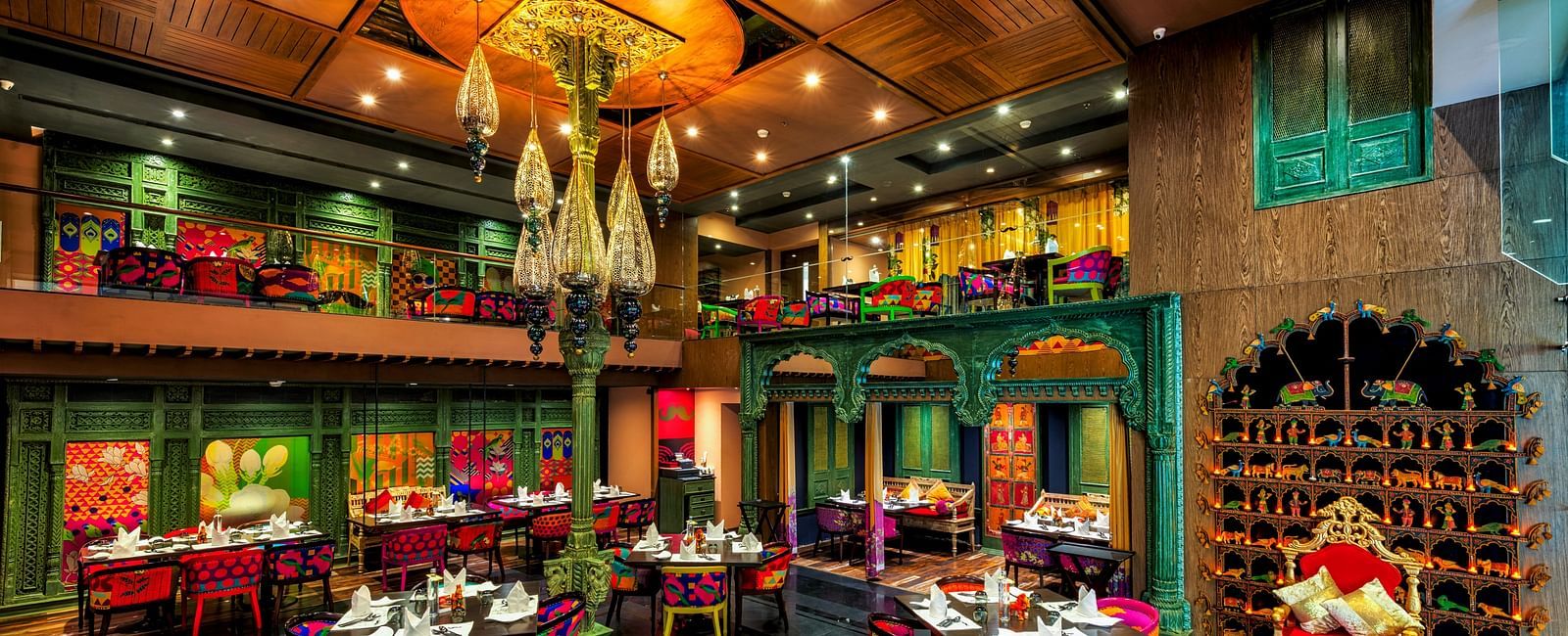 Seating arrangement of the restaurant at Grand Chennai By GRT Hotels.