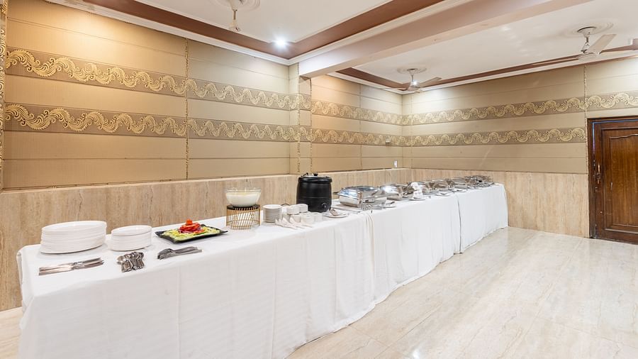 Buffet set up in the banquet hall with cutlery at DLS Park Grace, Haridwar.
