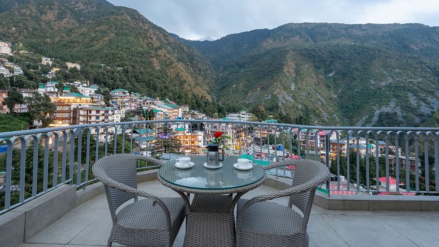 Open terrace with beautiful mountain views at  DLS Spring Valley Resort Dharamshala 